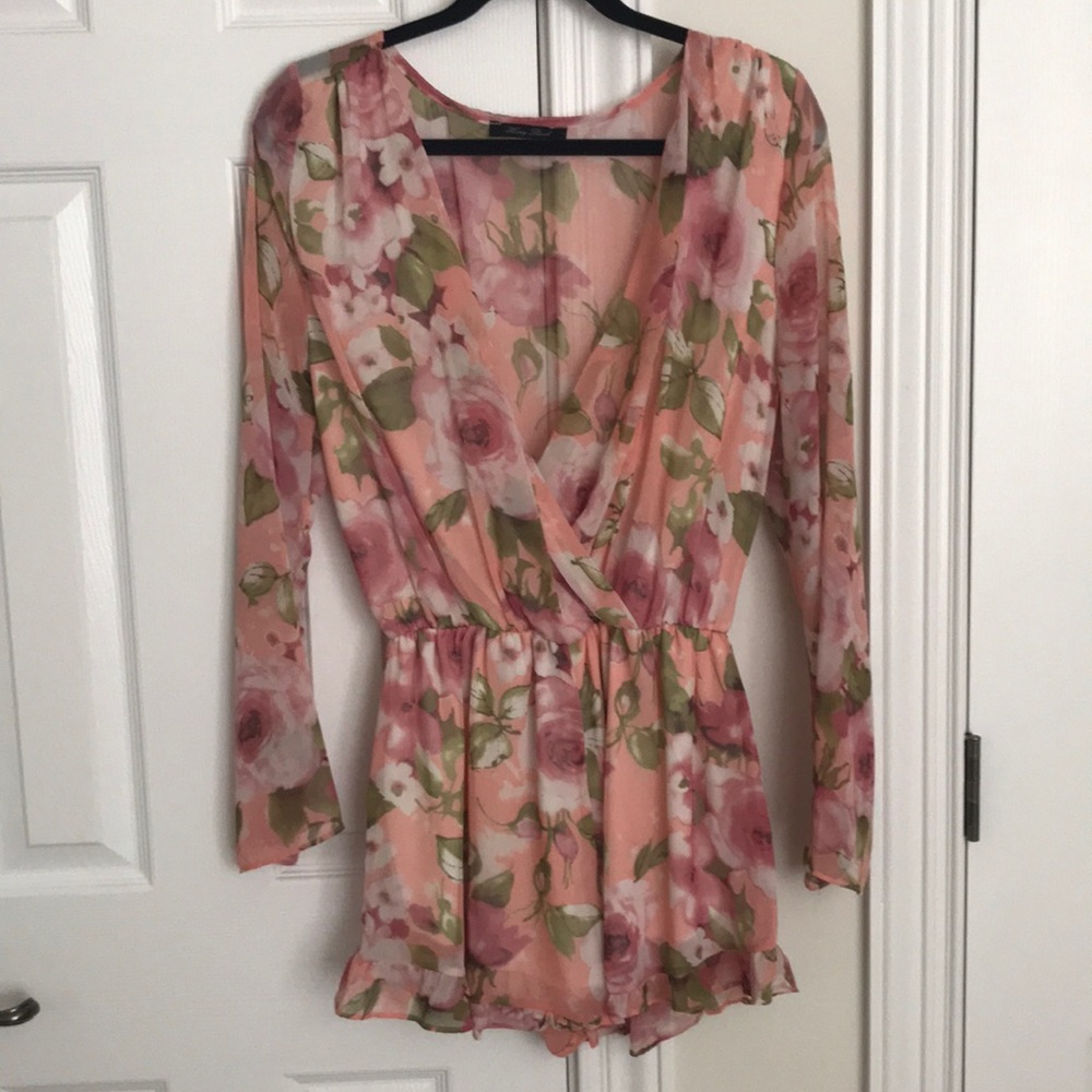 Deep V, sheer back floral romper.